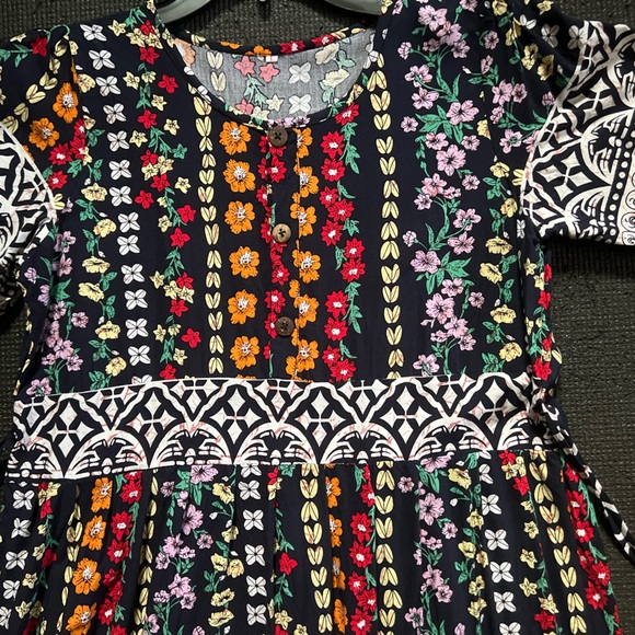 Floral patterns with wavy lines belt will make the edgy feminine appearance. NWT - Picture 5 of 5